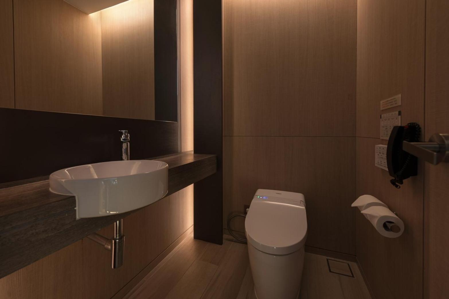 Mu Jiaoxi Hotel Екстериор снимка A modern bathroom