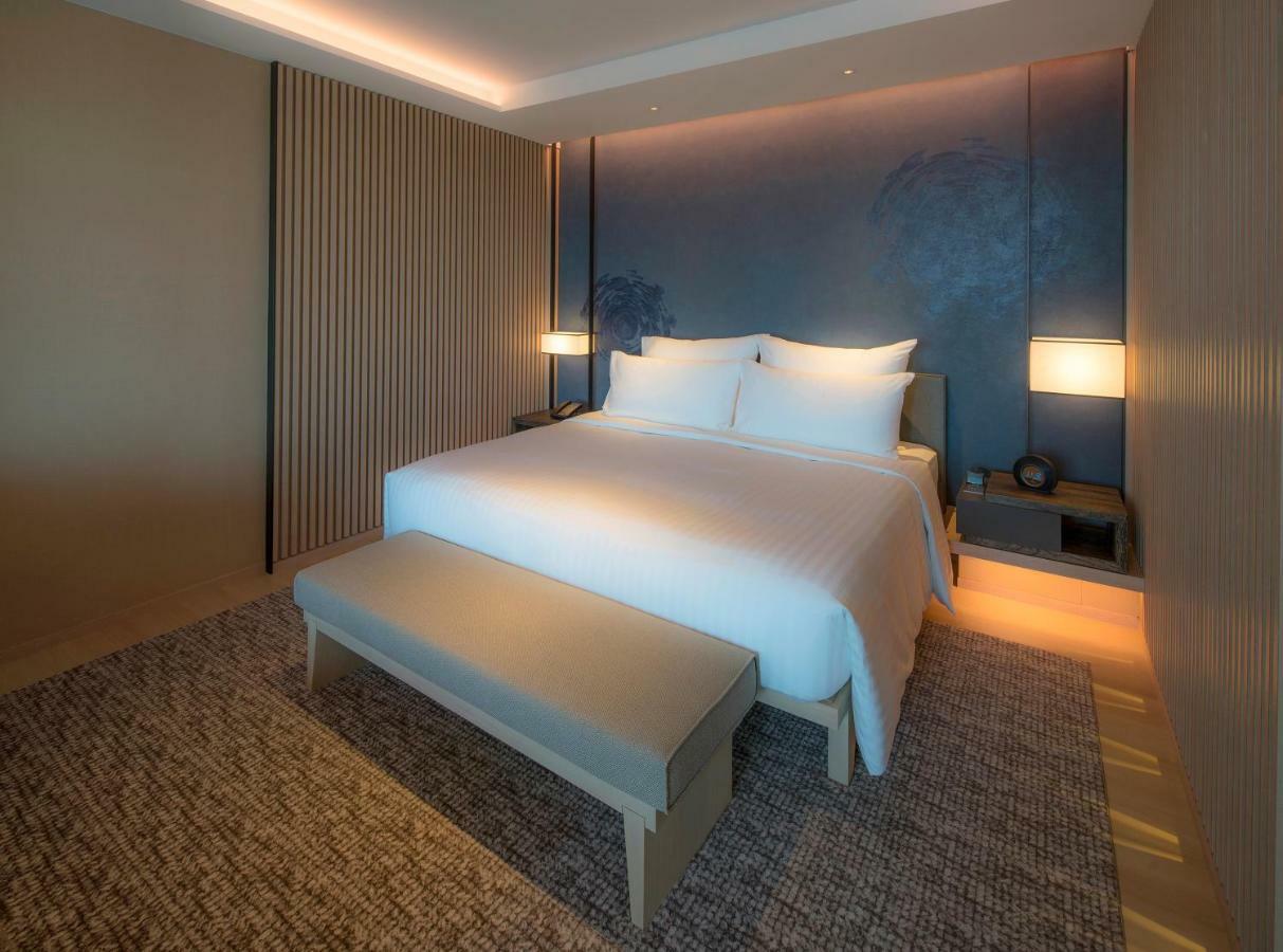 Mu Jiaoxi Hotel Екстериор снимка A bedroom at the hotel