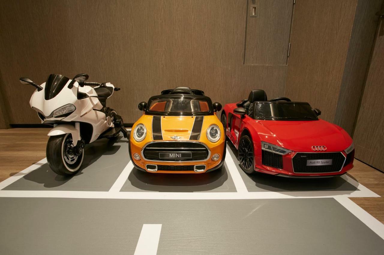 Mu Jiaoxi Hotel Екстериор снимка Children's electric cars and motorcycle